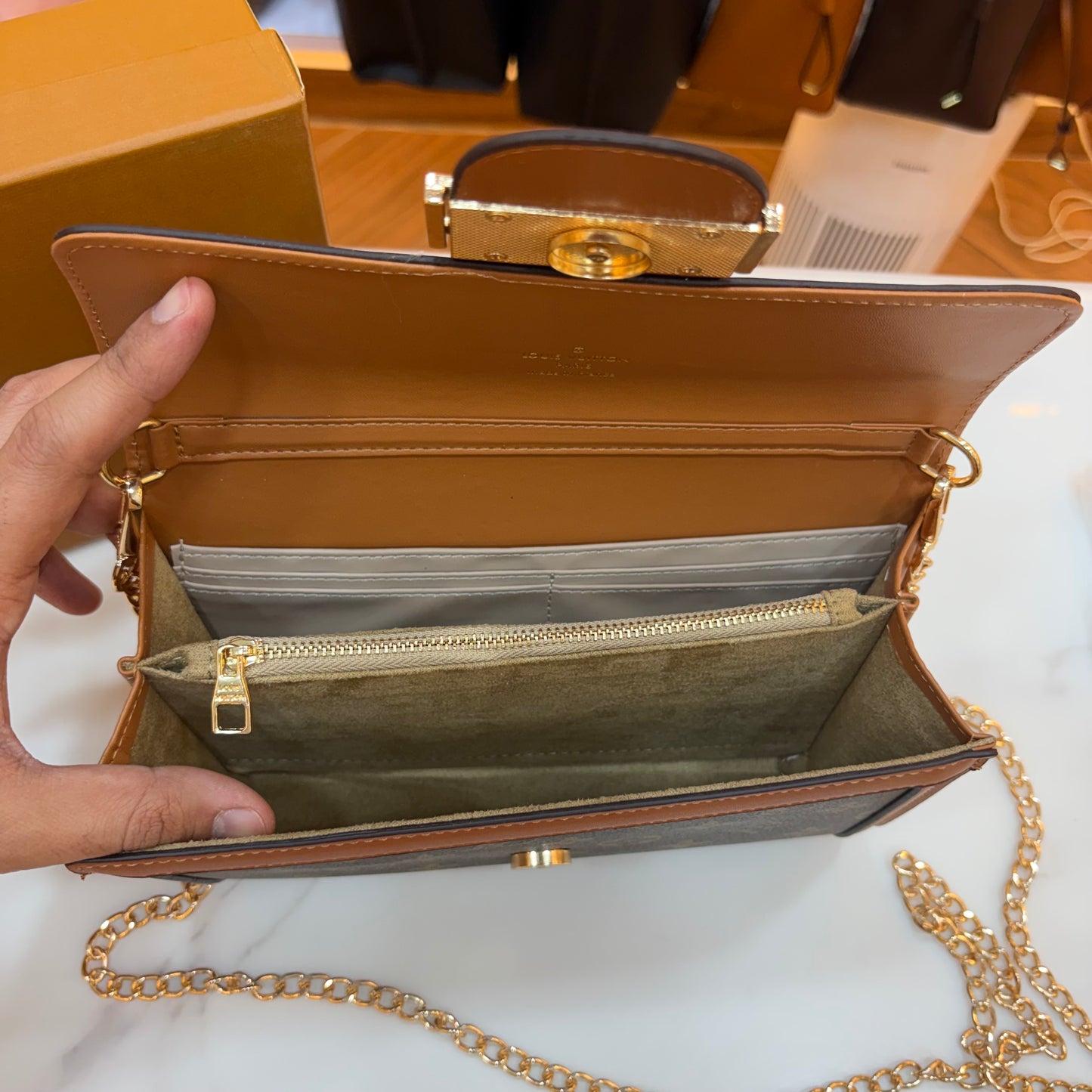 LV Clutch Sling - Monogram