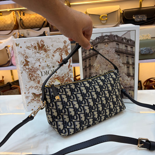 Medium CD Travel Nomad Pouch - Oblique jacquard and a military-inspired CD buckle