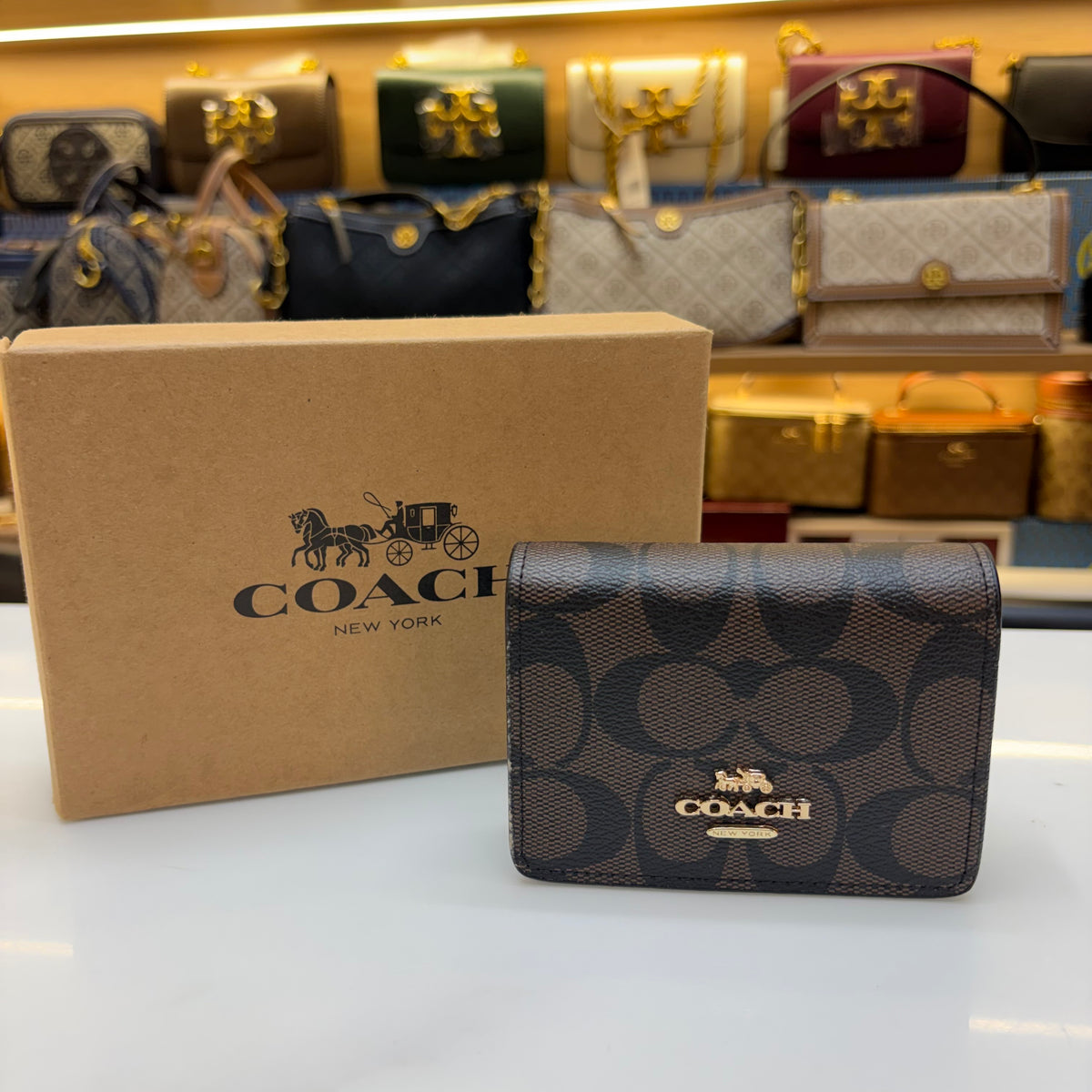 Coch Mini Wallet On A Chain In Signature Gold Walnut Black (Wristlet)