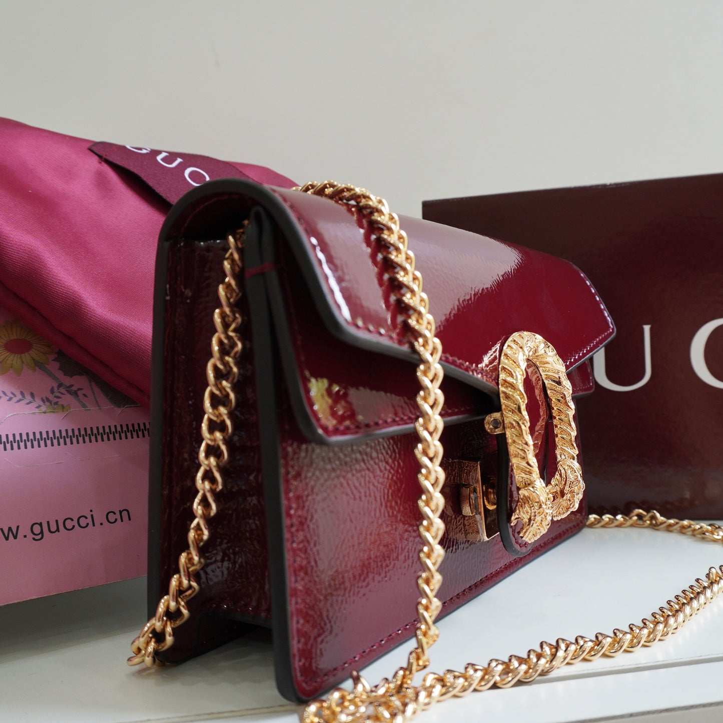 GG01 - Glossy Mini Chain Bag with Sculpted Buckle - Wine