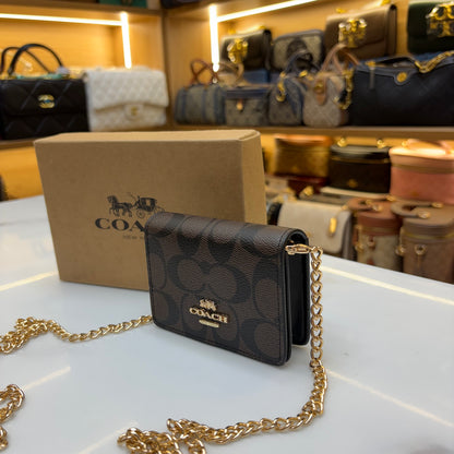 Coch Mini Wallet On A Chain In Signature Gold Walnut Black (Wristlet)