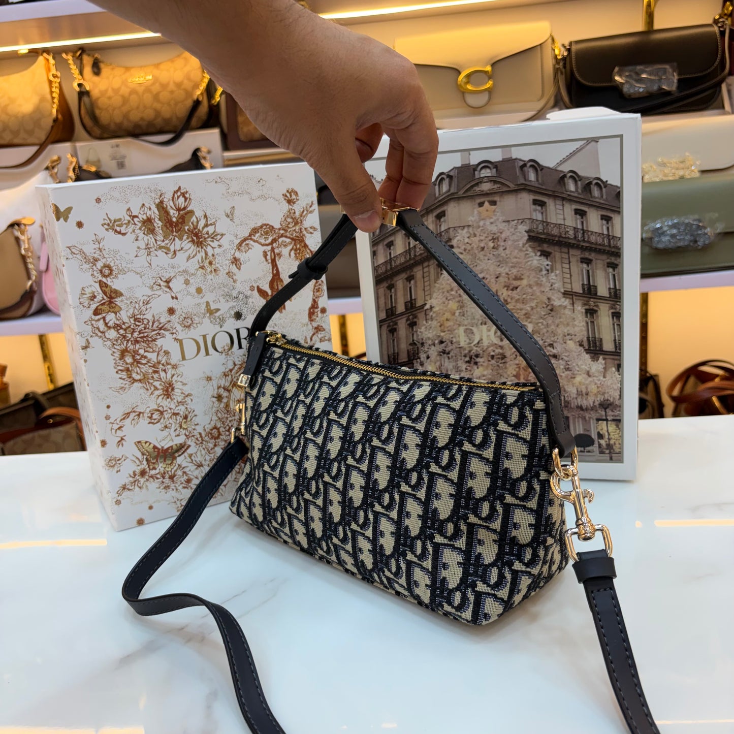 Medium CD Travel Nomad Pouch - Oblique jacquard and a military-inspired CD buckle