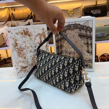 Medium CD Travel Nomad Pouch - Oblique jacquard and a military-inspired CD buckle