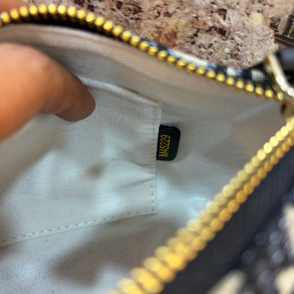 Medium CD Travel Nomad Pouch - Oblique jacquard and a military-inspired CD buckle