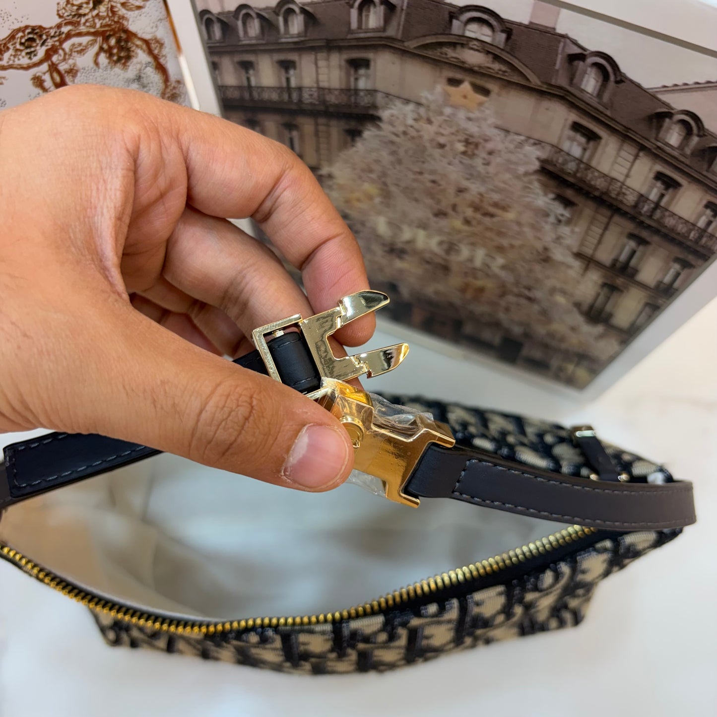 Medium CD Travel Nomad Pouch - Oblique jacquard and a military-inspired CD buckle