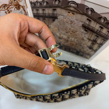 Medium CD Travel Nomad Pouch - Oblique jacquard and a military-inspired CD buckle