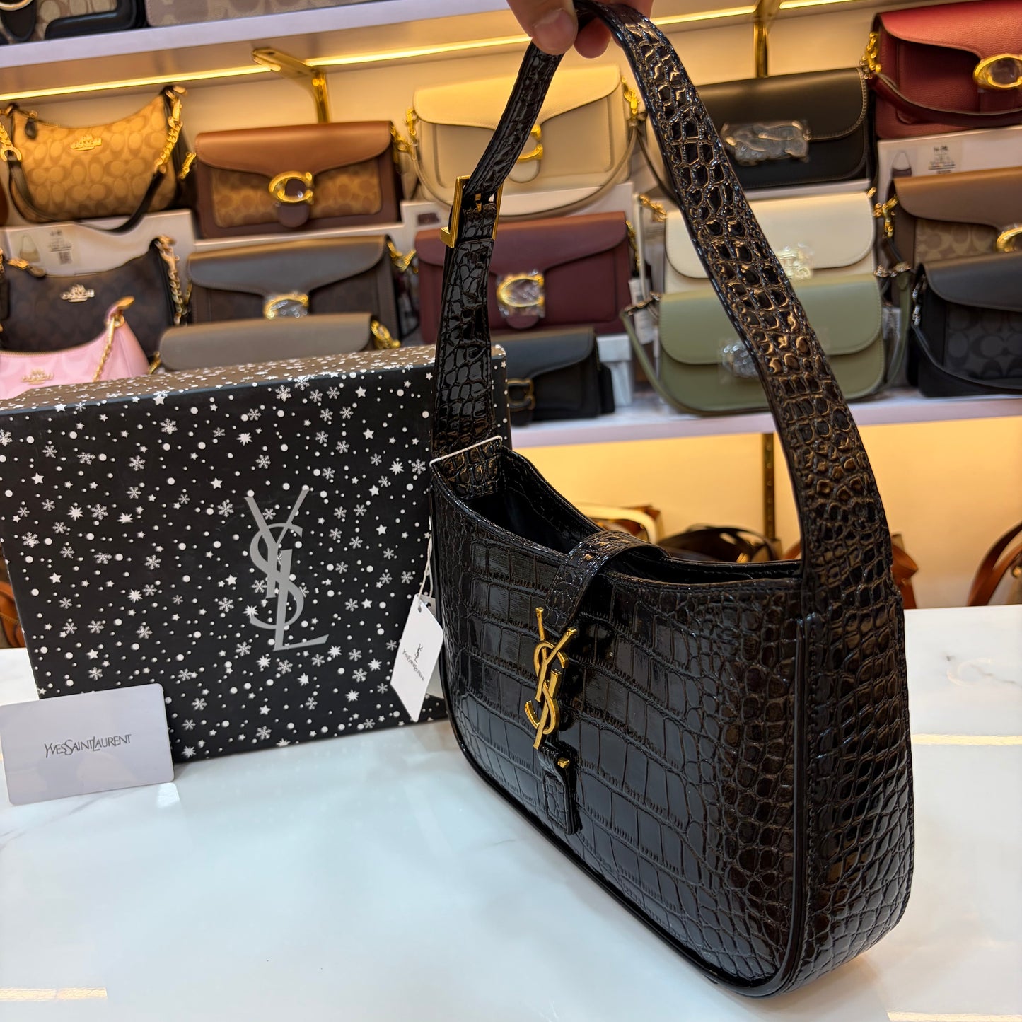 YSL LE 5 À 7 IN CROCODILE-EMBOSSED PATENT LEATHER Black