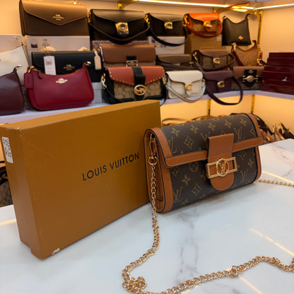 LV Clutch Sling - Monogram