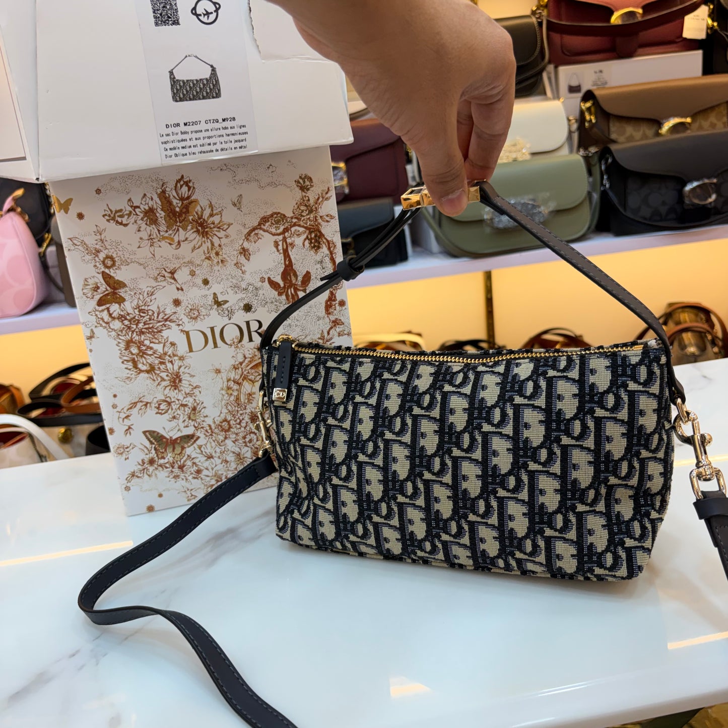 Medium CD Travel Nomad Pouch - Oblique jacquard and a military-inspired CD buckle