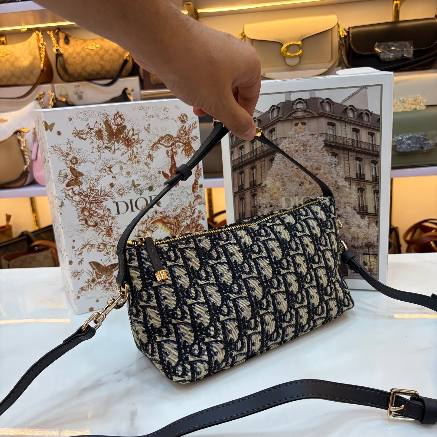 Medium CD Travel Nomad Pouch - Oblique jacquard and a military-inspired CD buckle