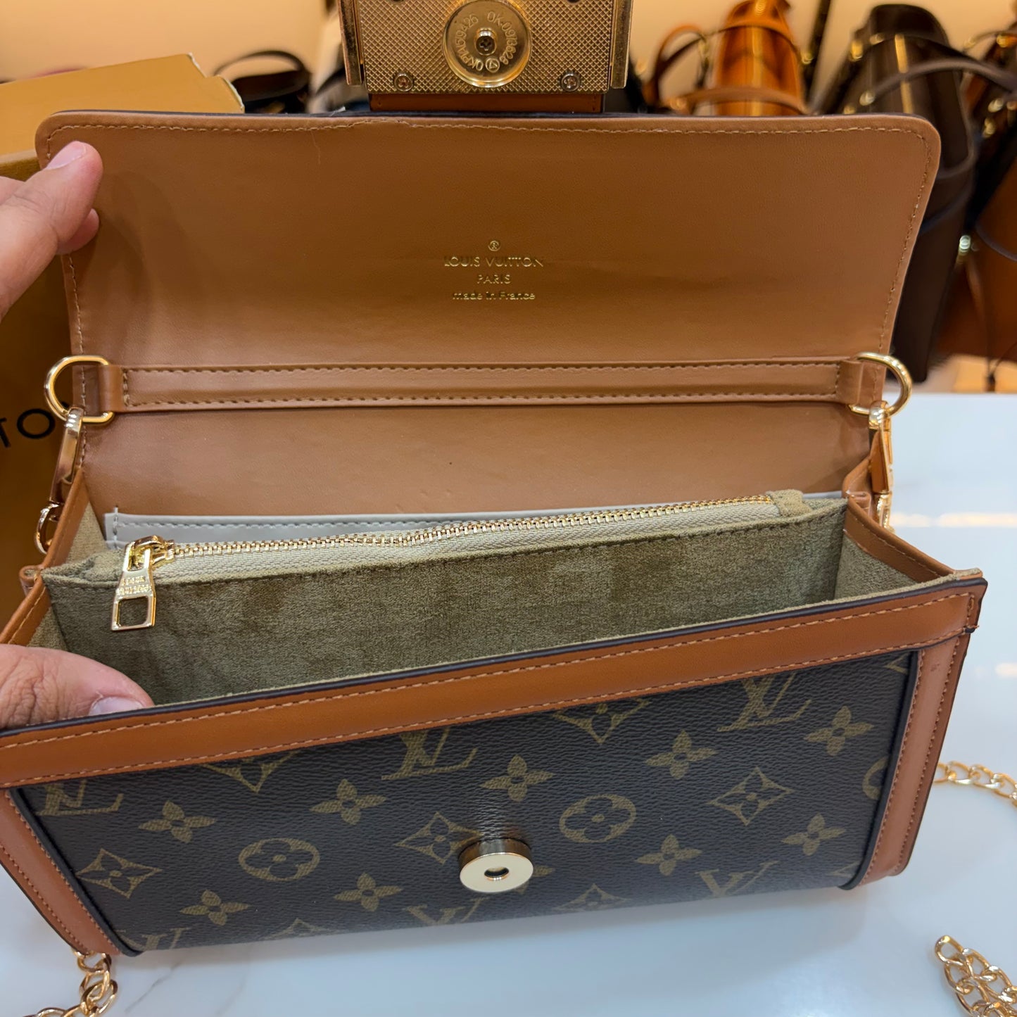 LV Clutch Sling - Monogram