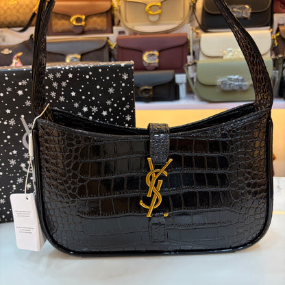 YSL LE 5 À 7 IN CROCODILE-EMBOSSED PATENT LEATHER Black
