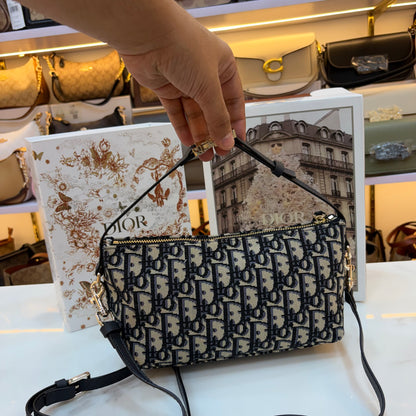 Medium CD Travel Nomad Pouch - Oblique jacquard and a military-inspired CD buckle