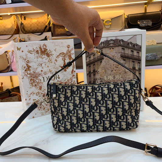 Medium CD Travel Nomad Pouch - Oblique jacquard and a military-inspired CD buckle