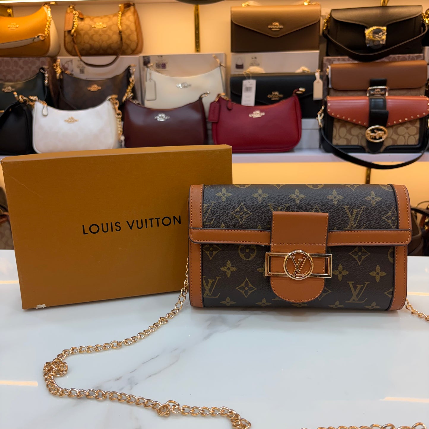 LV Clutch Sling - Monogram