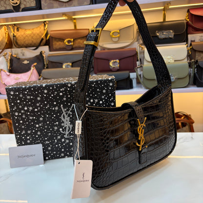 YSL LE 5 À 7 IN CROCODILE-EMBOSSED PATENT LEATHER Black