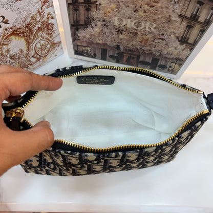 Medium CD Travel Nomad Pouch - Oblique jacquard and a military-inspired CD buckle