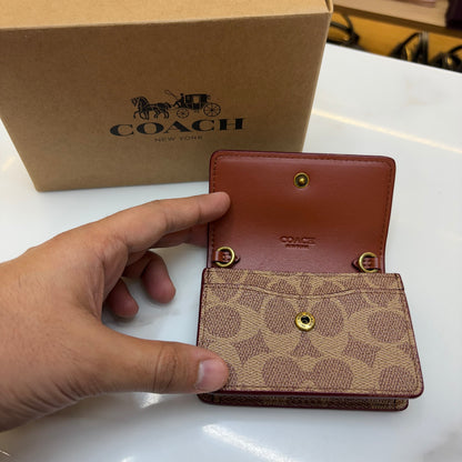 Coch Half Flap Card Case In Colorblock Signature (Wristlet)