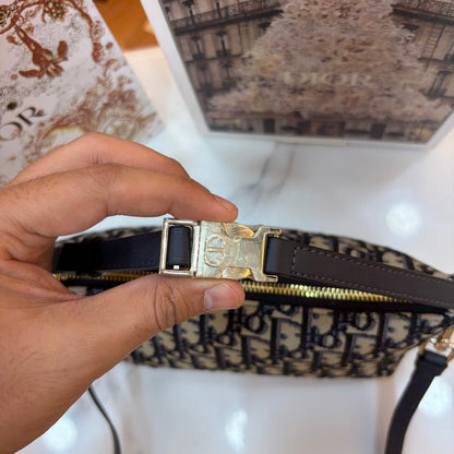 Medium CD Travel Nomad Pouch - Oblique jacquard and a military-inspired CD buckle