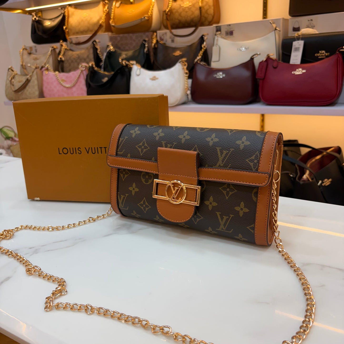 LV Clutch Sling - Monogram