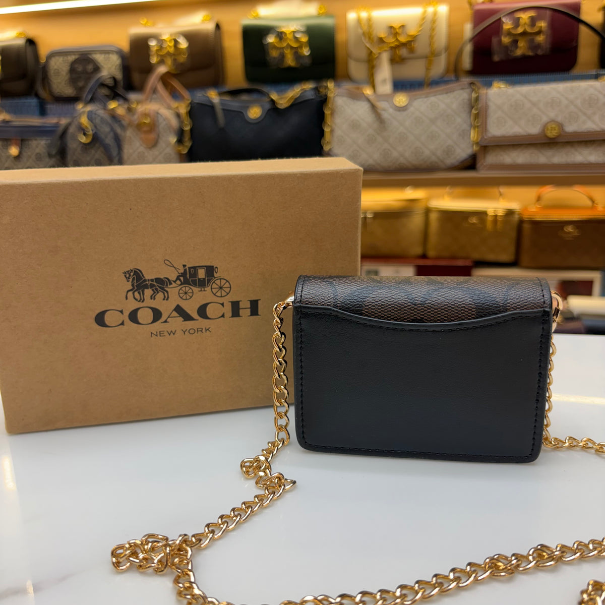 Coch Mini Wallet On A Chain In Signature Gold Walnut Black (Wristlet)