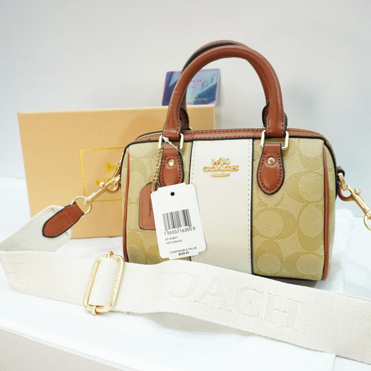 CH717 - Duffle Style Sling- Signature Tan Beige