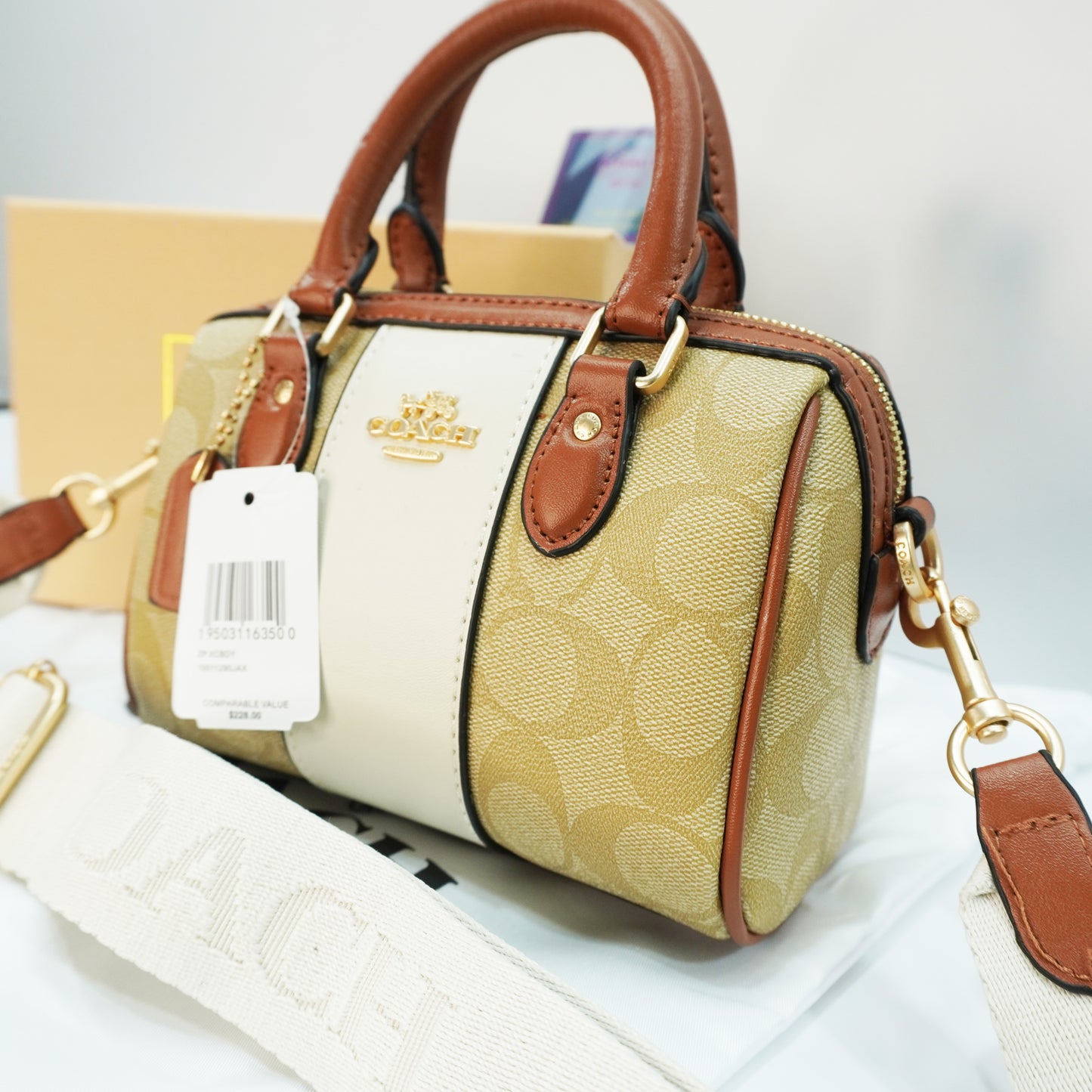 CH717 - Duffle Style Sling- Signature Tan Beige