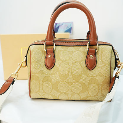 CH717 - Duffle Style Sling- Signature Tan Beige