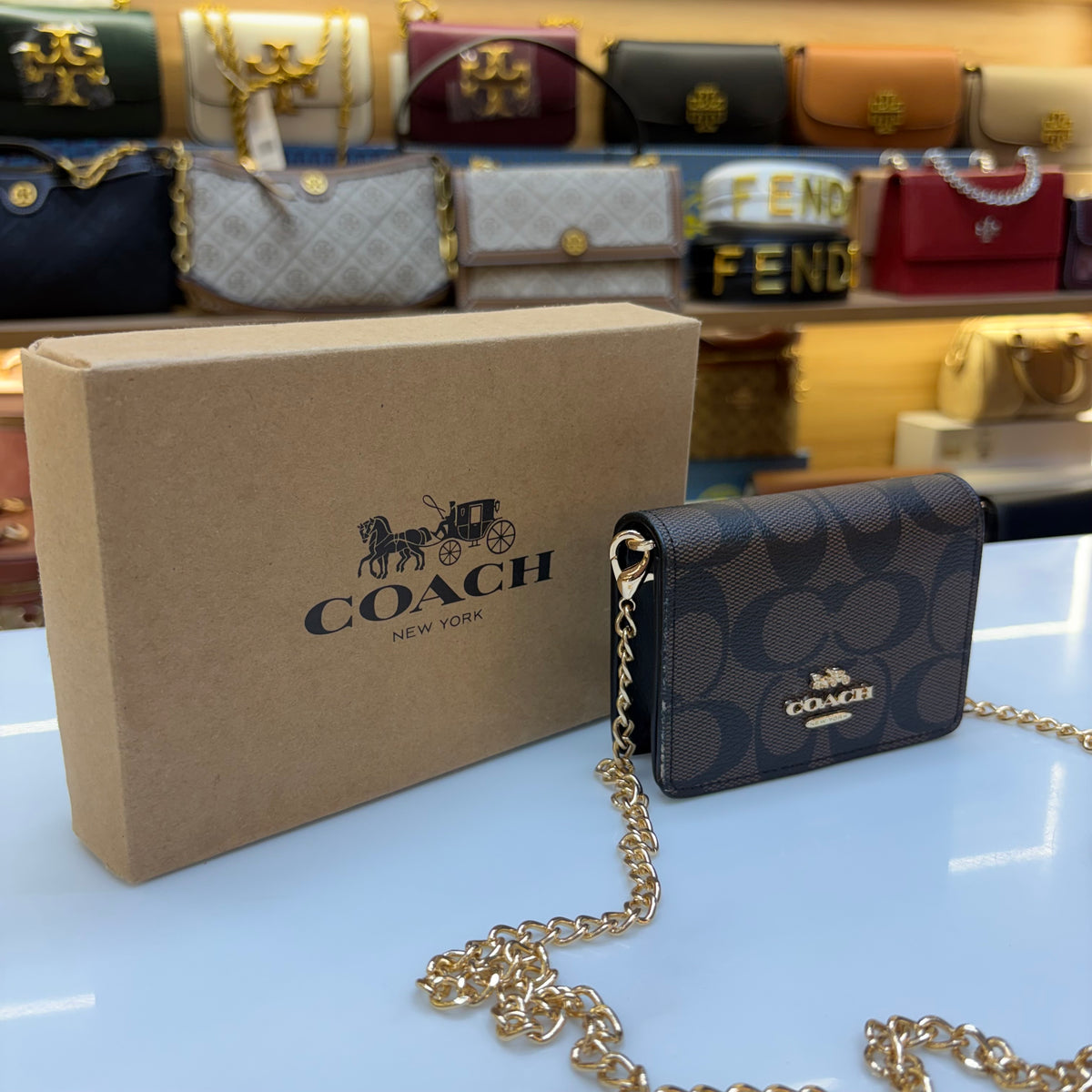 Coch Mini Wallet On A Chain In Signature Gold Walnut Black (Wristlet)