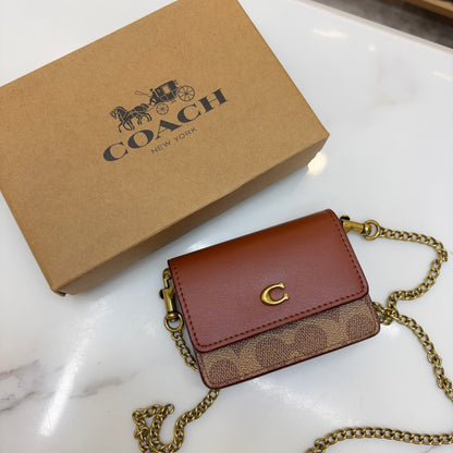 Coch Half Flap Card Case In Colorblock Signature (Wristlet)
