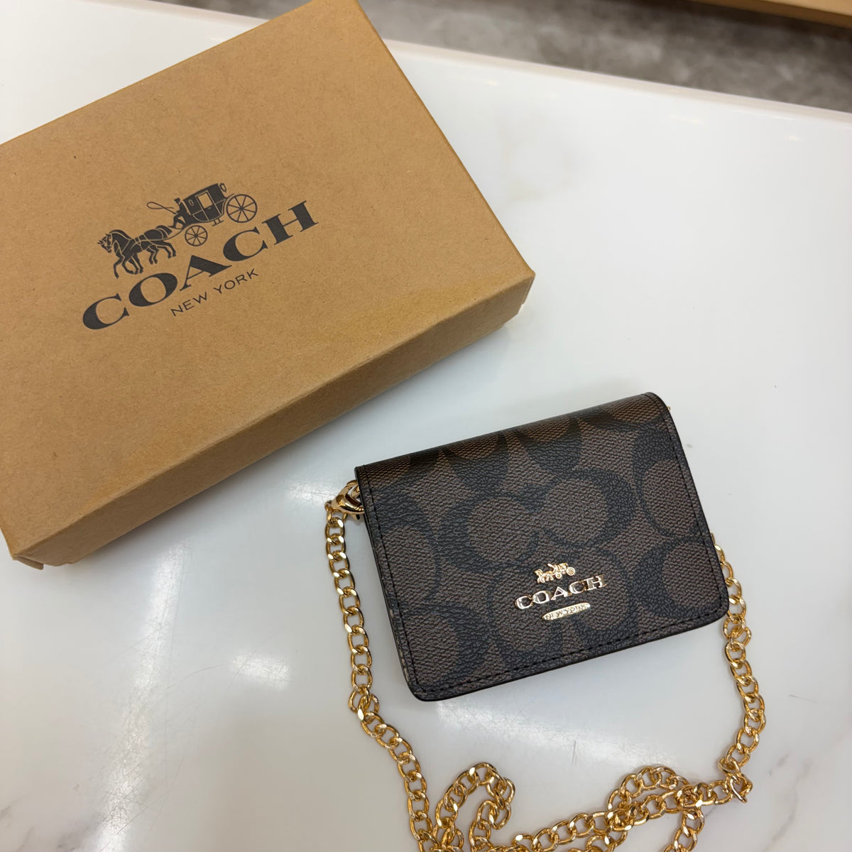 Coch Mini Wallet On A Chain In Signature Gold Walnut Black (Wristlet)