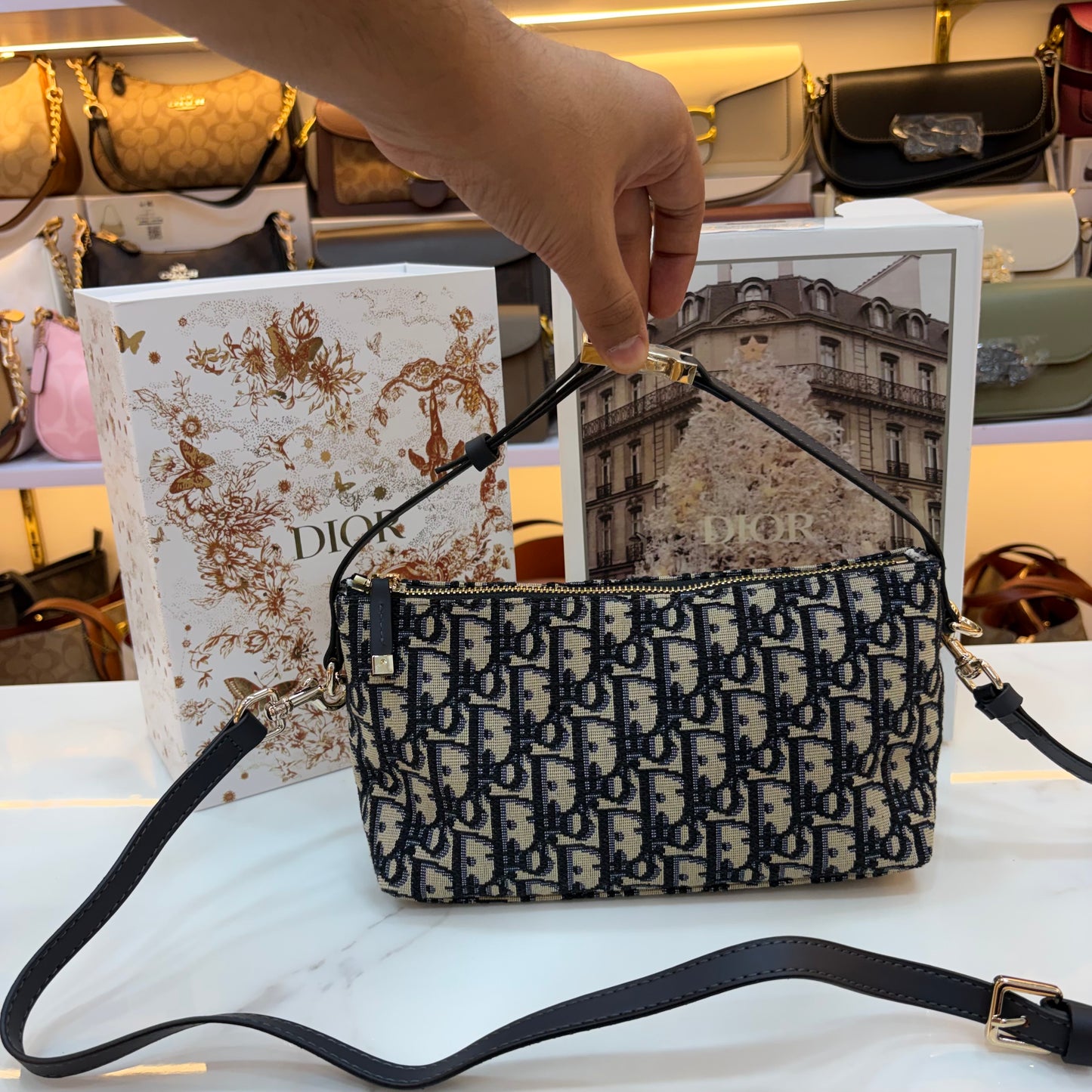 Medium CD Travel Nomad Pouch - Oblique jacquard and a military-inspired CD buckle